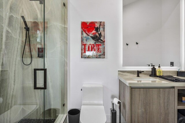8387 Sawpine Rd, Delray Beach, FL 33446 - full bath featuring a stall shower, toilet, and vanity
