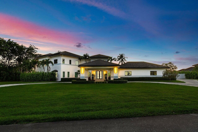 8387 Sawpine Rd, Delray Beach, FL 33446 - view of front of house with a front yard and stucco siding