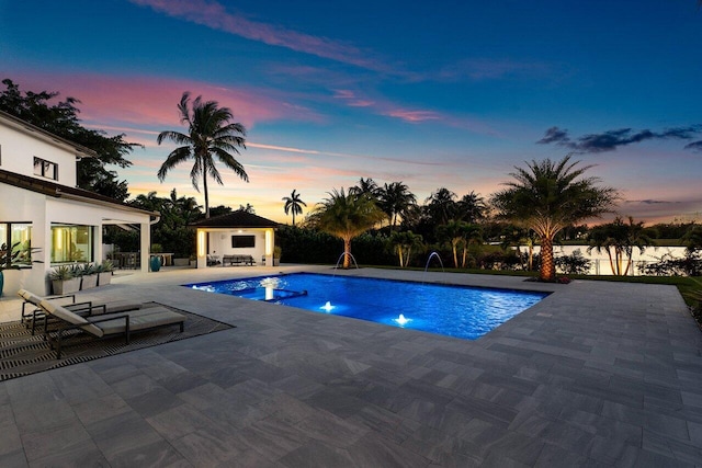8387 Sawpine Rd, Delray Beach, FL 33446 - outdoor pool with a patio area, a storage structure, and an outbuilding