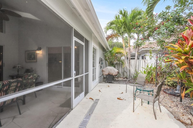 view of patio featuring fence