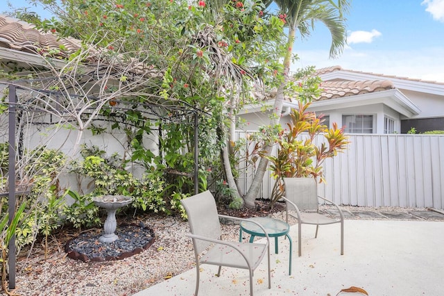 view of patio with fence