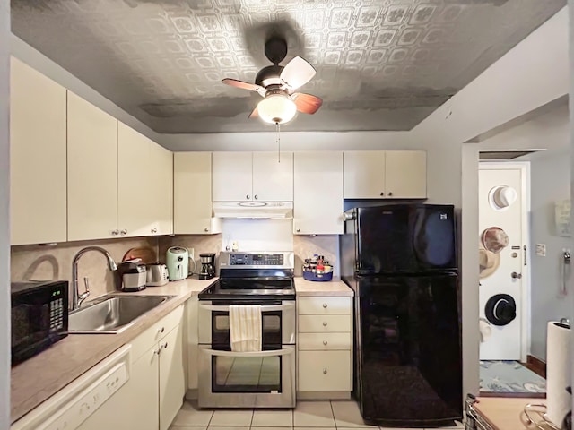 kitchen featuring an ornate ceiling, a sink, black appliances, light countertops, and under cabinet range hood