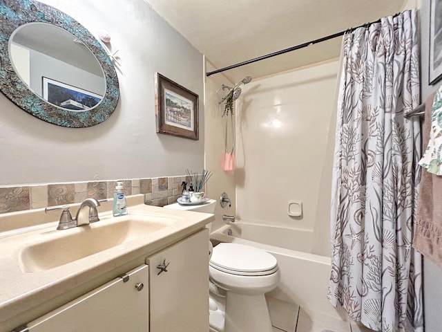 bathroom with vanity, tile patterned floors, shower / tub combo, and toilet