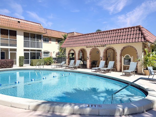 pool with a patio area