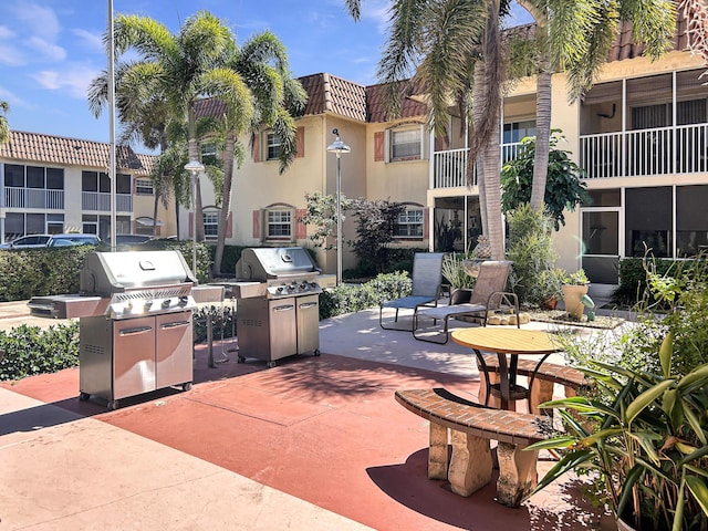 view of patio featuring a grill