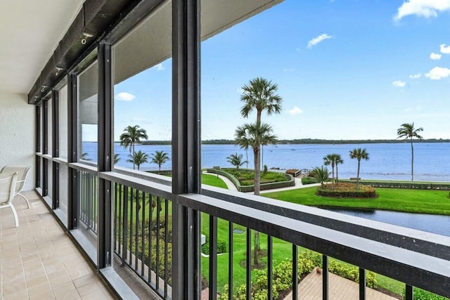 balcony featuring a water view