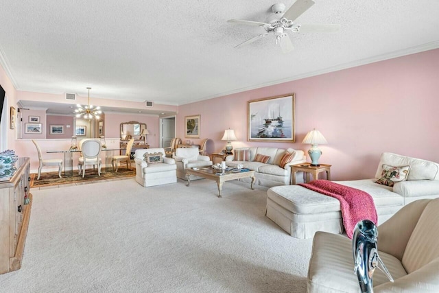 carpeted living room with visible vents, a textured ceiling, ornamental molding, and ceiling fan with notable chandelier