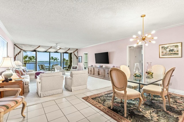 dining room featuring light tile patterned floors, a textured ceiling, an inviting chandelier, and crown molding