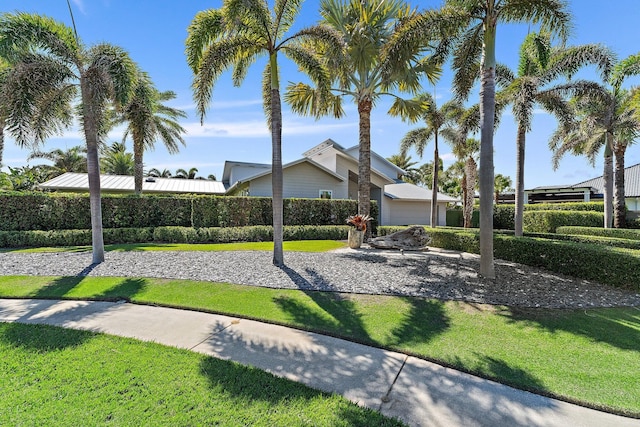 exterior space featuring a front lawn