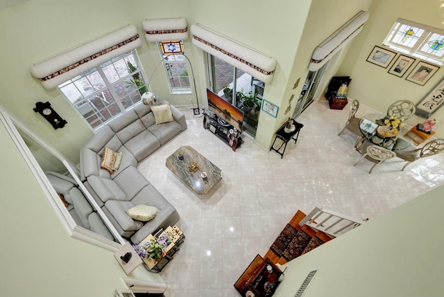 living area featuring tile patterned floors