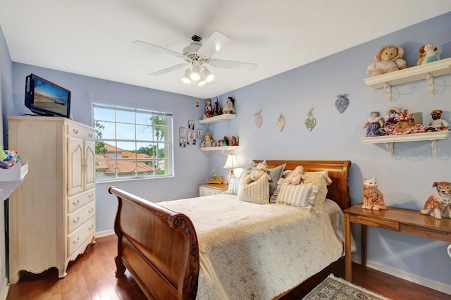 bedroom with a ceiling fan, light wood-type flooring, and baseboards