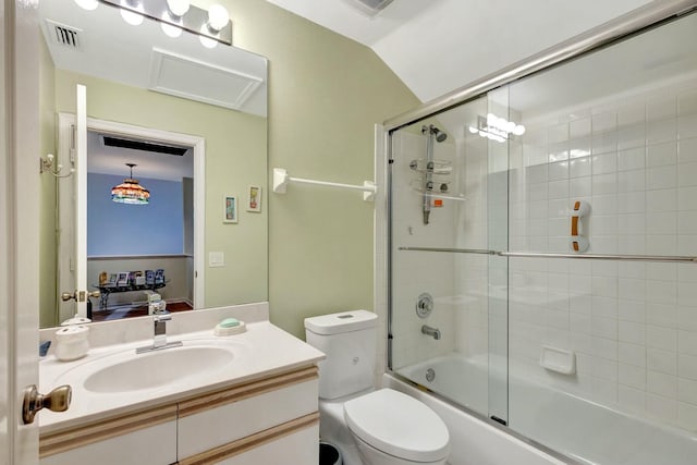 full bathroom with vanity, toilet, visible vents, and shower / bath combination with glass door