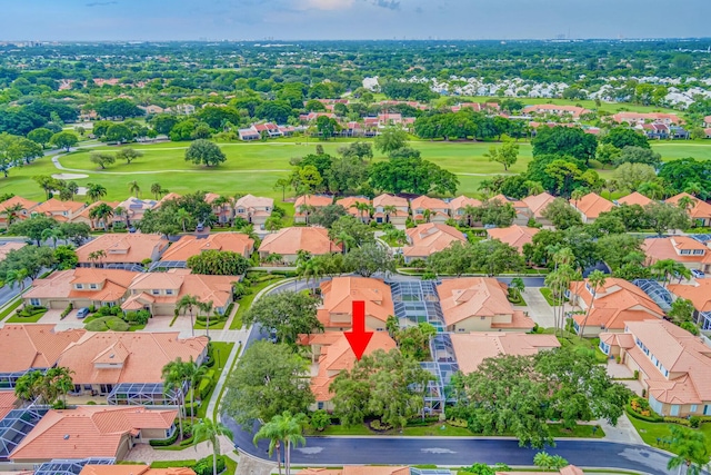 aerial view featuring golf course view and a residential view