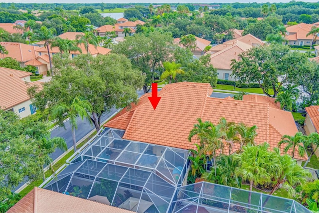 birds eye view of property with a residential view