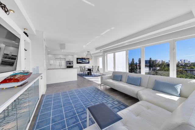 living area featuring a view of city and wood finished floors