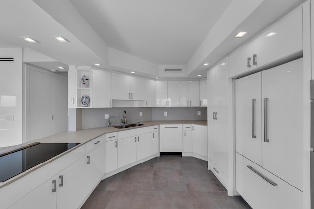 kitchen with decorative backsplash, a sink, open shelves, white cabinetry, and black electric cooktop