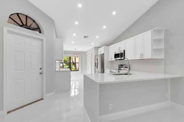 kitchen with visible vents, open shelves, light countertops, stainless steel appliances, and a sink