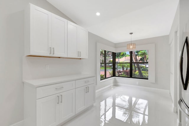 dining space featuring recessed lighting and baseboards