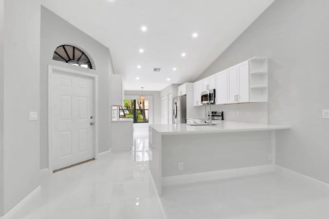 kitchen with open shelves, stainless steel appliances, a peninsula, white cabinets, and light countertops