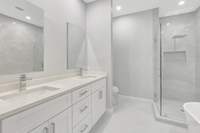 full bathroom featuring double vanity, visible vents, a shower stall, and a sink