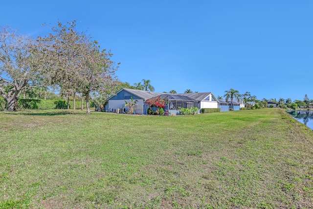 view of yard featuring a lanai