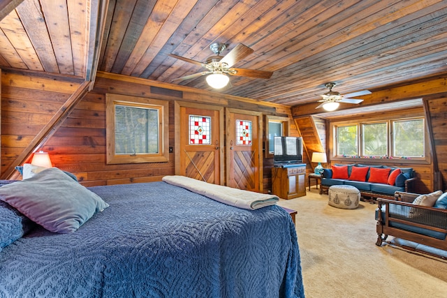 bedroom featuring wooden walls, carpet flooring, and wooden ceiling