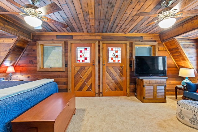 bedroom with carpet, wood ceiling, and wood walls