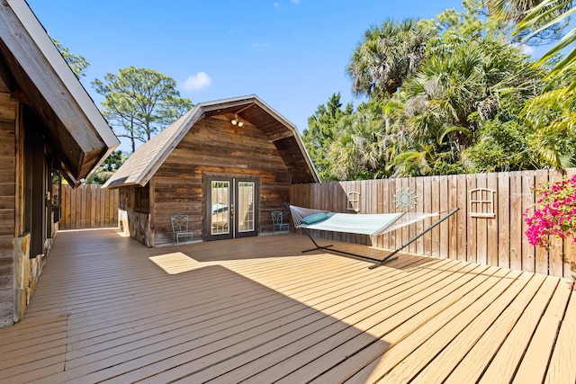 wooden deck with french doors and fence