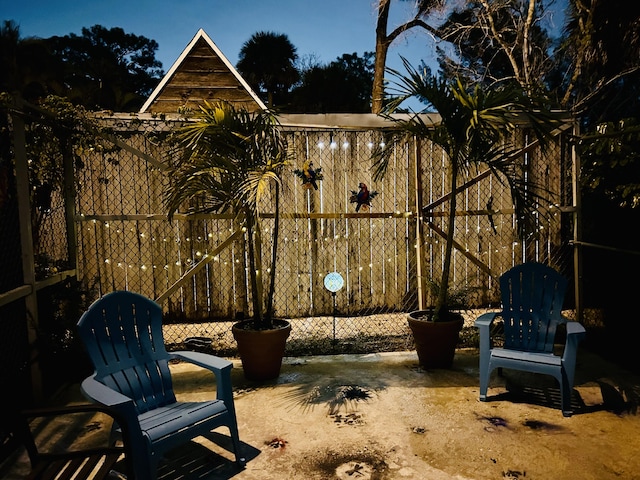 view of patio featuring fence