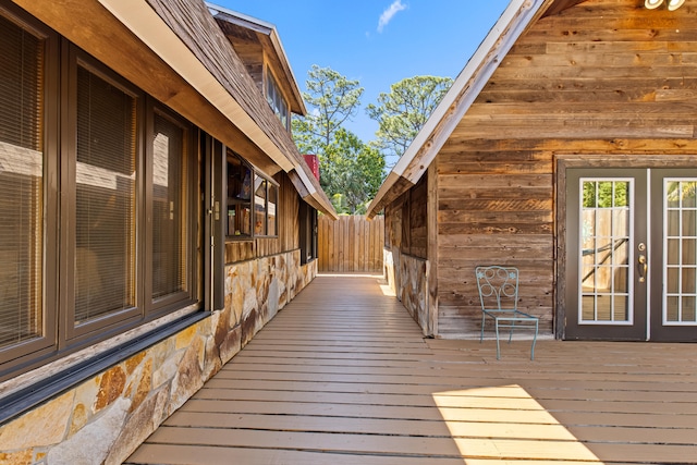 wooden deck featuring french doors