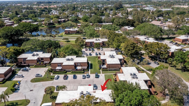 aerial view featuring a water view and a residential view