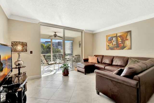 living room with ornamental molding, a textured ceiling, floor to ceiling windows, light tile patterned floors, and baseboards