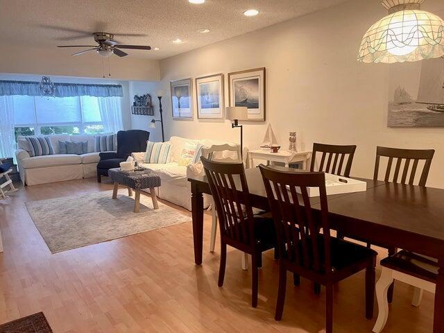 dining room with recessed lighting, light wood-style floors, ceiling fan, and a textured ceiling