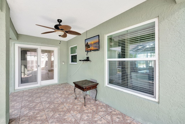 view of patio / terrace featuring a ceiling fan