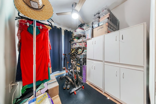 interior space featuring ceiling fan