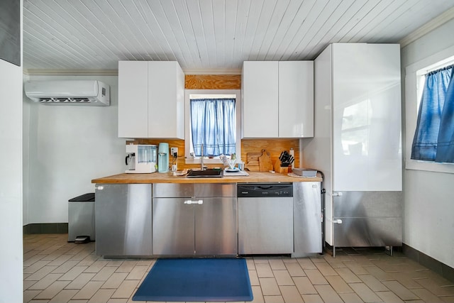 kitchen with a wealth of natural light, white cabinets, dishwasher, and a wall unit AC