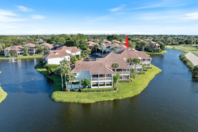 aerial view featuring a residential view and a water view