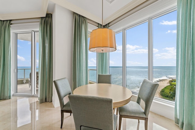 dining room with a water view