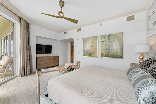 bedroom with a ceiling fan, carpet, visible vents, ornamental molding, and access to exterior