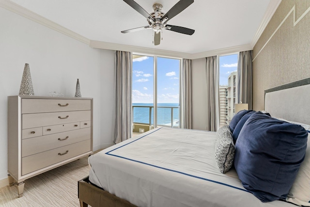 bedroom featuring a ceiling fan, crown molding, access to exterior, and a water view