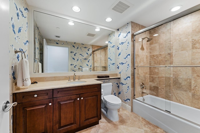 bathroom featuring combined bath / shower with glass door, visible vents, toilet, and recessed lighting