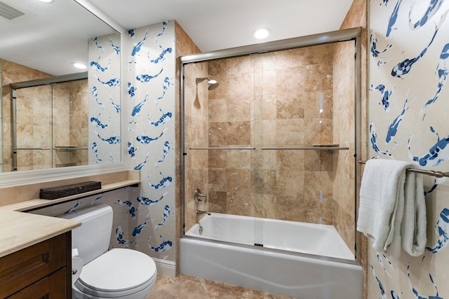 bathroom featuring vanity, visible vents, shower / bath combination with glass door, tile patterned flooring, and toilet