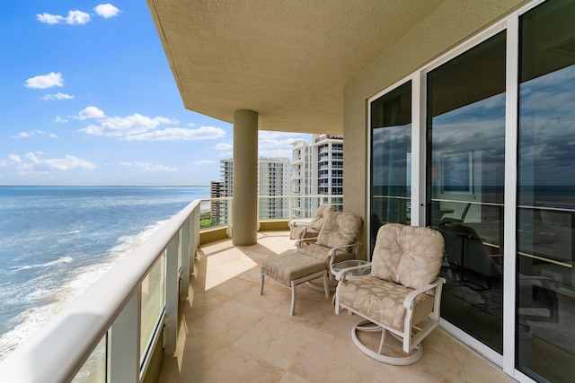 balcony with a city view and a water view