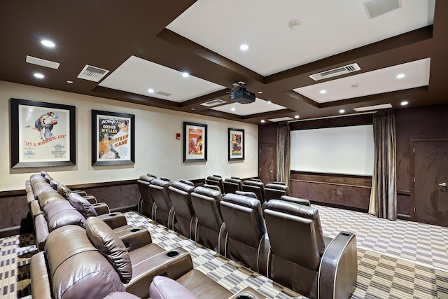 cinema with visible vents, carpet floors, and a wainscoted wall