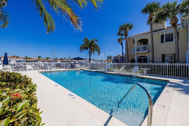 community pool with fence