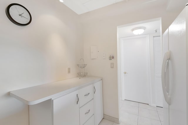 bathroom with tile patterned flooring