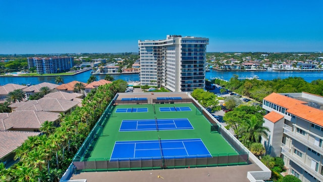 aerial view featuring a view of city and a water view