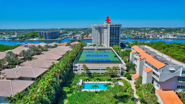 birds eye view of property with a water view