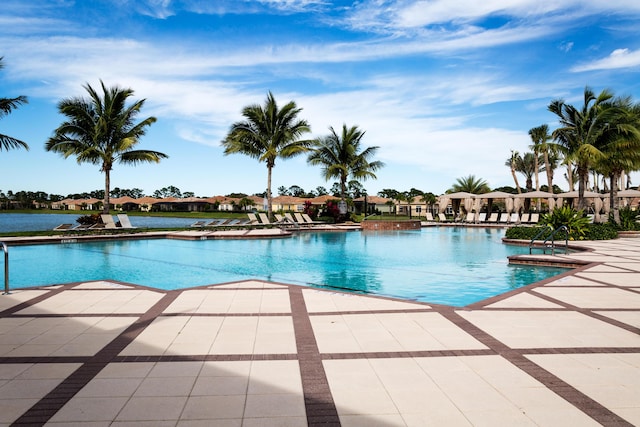 community pool featuring a patio area