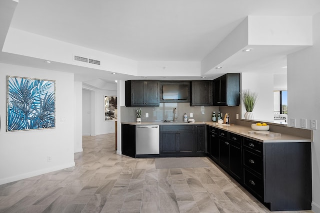 kitchen with visible vents, recessed lighting, a sink, light countertops, and stainless steel dishwasher